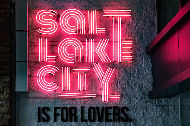 Neon sign that reads SLC is for lovers